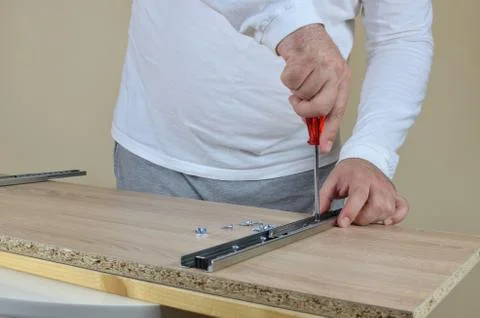 Installing a Drawer Slides Stock Photos