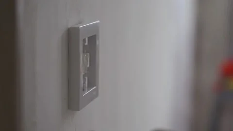Installing an electric switch on the wall during the renovation of the apartment Stock Footage 278258472