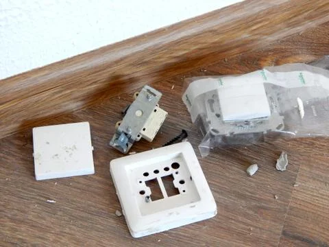 Installing an electrical outlet in the house Stock Photos