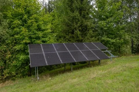 Installing electrical panels on a lawn in the mountains Stock Photos