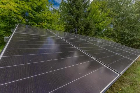 Installing electrical panels on a lawn in the mountains Stock Photos
