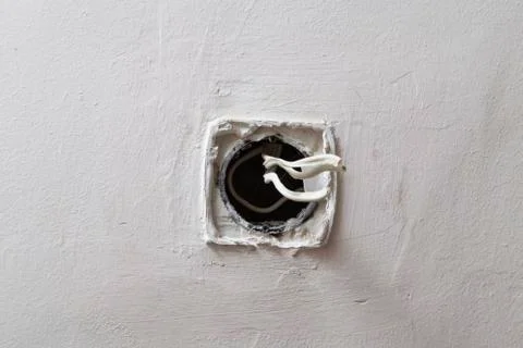 Installing an electrical socket box. Stock Photos