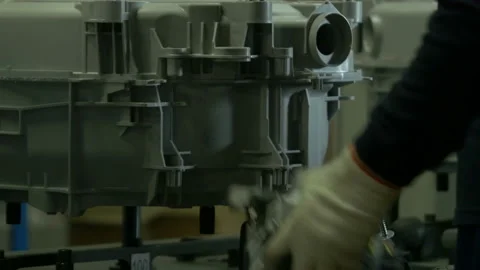 Installing of engine of washing machine at factory Stock Footage 90022523