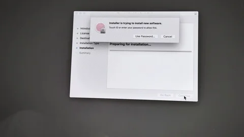 Installing Final Cut Pro X video editing software Stock Footage 97229692