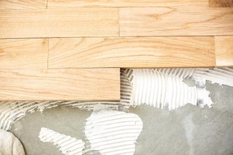 Installing a floor system  zoom in Stock-Fotos