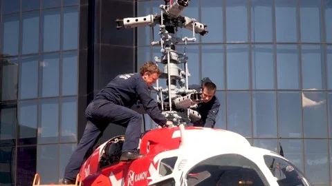 Installing gearbox and rotor column on Ka-226 helicopter using truck crane. Stock Footage 106491726