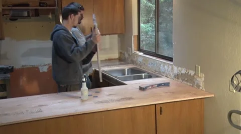 Installing Granite Counter Tops 動画素材 49588384