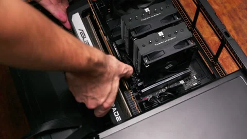 Installing graphics card into powerful g... | Stock Video | Pond5