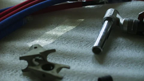 Installing heating pipes with a tool Stock Footage 295259653