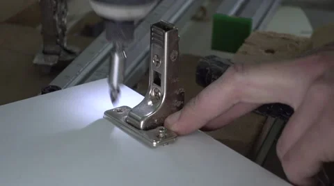 Installing hinges in MDF board Stock Footage 60399729