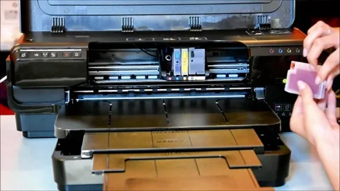 Installing Ink Cartridges in a High-Capacity Office Printer 스톡 동영상 320521435