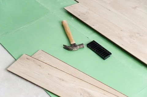 Installing laminate flooring. Stock Photos