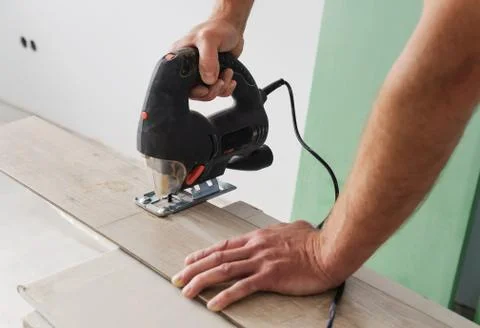 Installing laminate flooring. Stock Photos