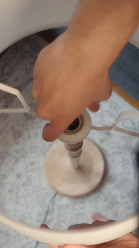 Installing Lampshade on Floor Lamp Close up Stock Footage 342588905