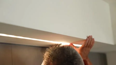 Installing LED Strip Lighting in a Drywall Structure for Sleek, Modern Illu.. Stock Footage 291607508