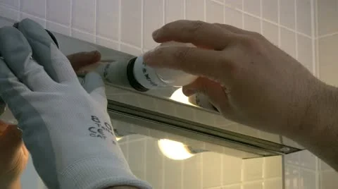 Installing light bulbs Stock Footage 10855842
