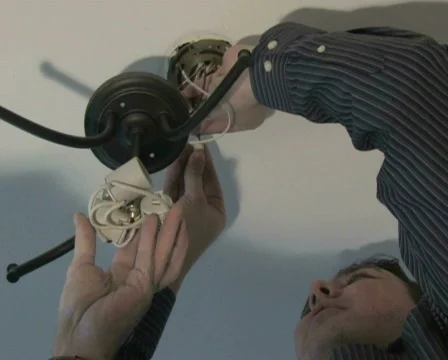 Installing Light Fixture Stock-Footage 284394