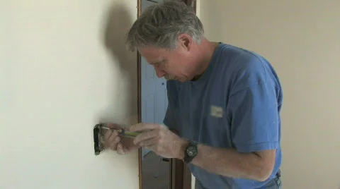 Installing Light Switch 1 Stock Footage 279988