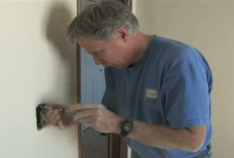 Installing Light Switch 1 Stock Footage 284041