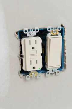 Installing light switch after home renovation Stock Photos