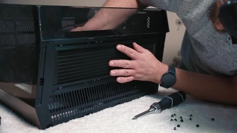 Installing liquid cooling radiator into computer case Stock Footage 335068099