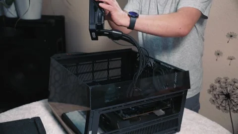 Installing liquid cooling system into compact computer case Stock Footage 325802695