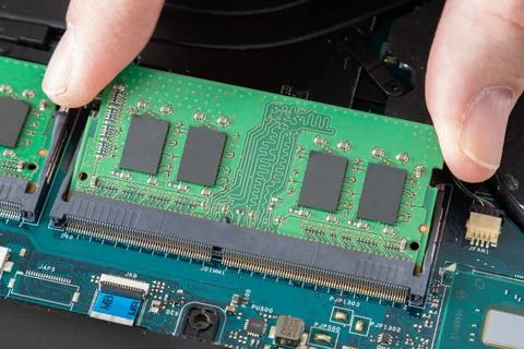 Installing a memory module in a laptop computer Foto stock