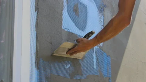 Installing mesh on the  facade Stock Footage 119062165