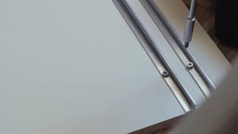 Installing Metal Hardware Rails On New Wardrobe Stock-Footage 338375278