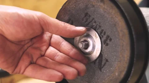 Installing a metal washer 4K Video stock 195010005