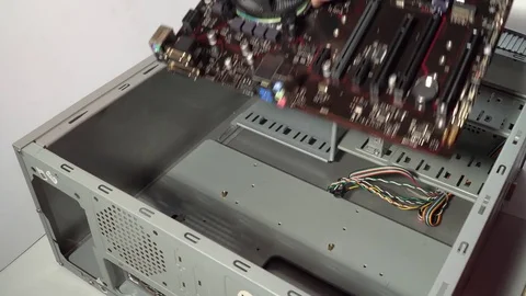 Installing the motherboard in computer case Stock Footage 83167796