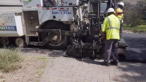 Installing new asphalt surface Stock-Footage 127645157
