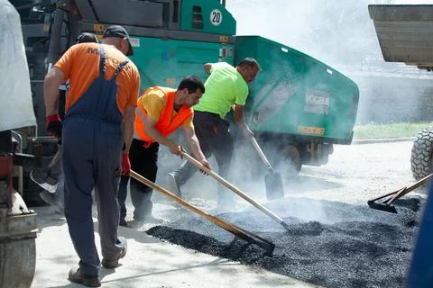 Installing new asphalt surface on a road Foto stock