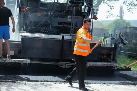 Installing new asphalt surface on a road Foto stock