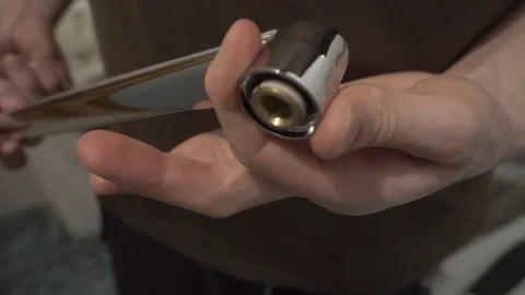 Installing a new faucet in the bathroom Stock Footage 108308020