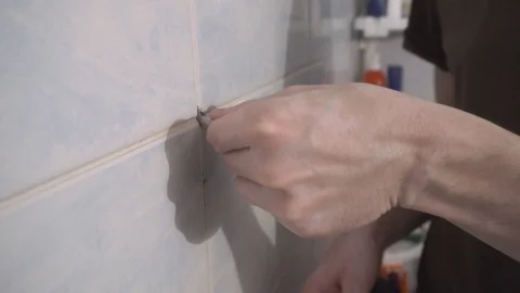 Installing a new faucet in the bathroom Stock Footage 108308435