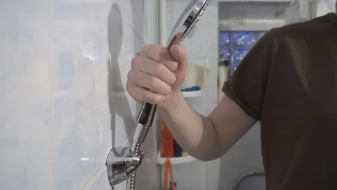 Installing a new faucet in the bathroom Stock Footage 108308503