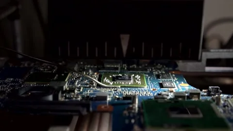 Installing a new microchip on a special device Stock Footage 142375371