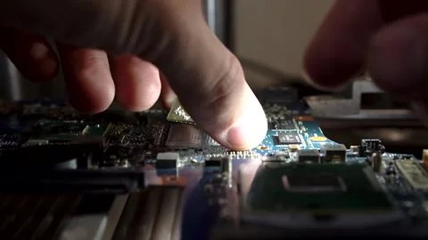 Installing a new microchip on a special device Stock Footage 142375383