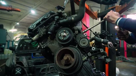 Installing a new powerful engine Stock Footage 328234386