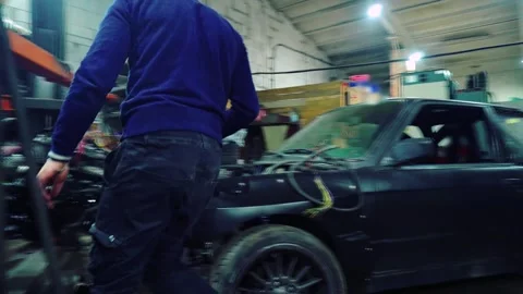 Installing a new powerful engine Stock Footage 328235399