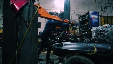 Installing a new powerful engine Stock Footage 328235405