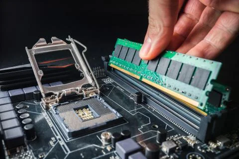 Installing a new RAM DDR memory for a personal computer processor socket in a 写真素材