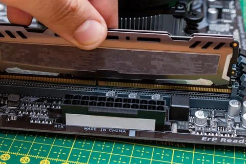Installing a new RAM DDR memory for a personal computer processor socket in a 스톡 사진