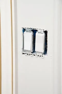 Installing new switches in the wall Stock Photos