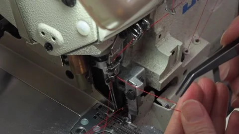 Installing nobody in a sewing machine close up Stock-Footage 130830053