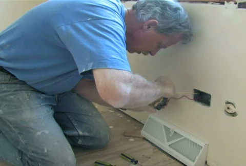 Installing Outlet 1 Video stock 284047