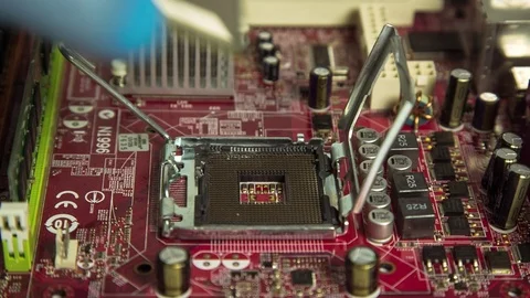 Installing processor on a motherboard/Installing a computer processor Stock Footage 77650470