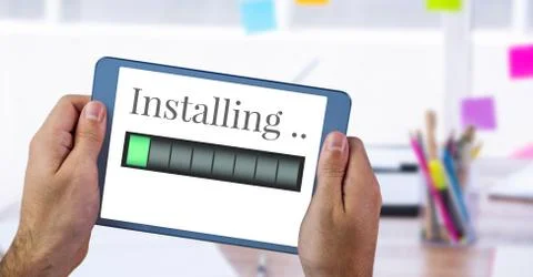Installing progress status power bar and tablet device Stock Photos