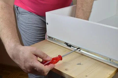 Installing a Rail  on a Drawer Stock Photos